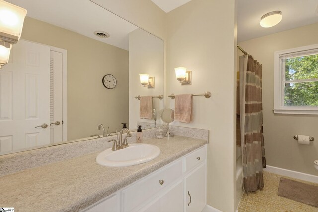 306 Verner Dr, Greenville, SC 29617 - bathroom featuring vanity, tile patterned flooring, and shower / tub combo with curtain