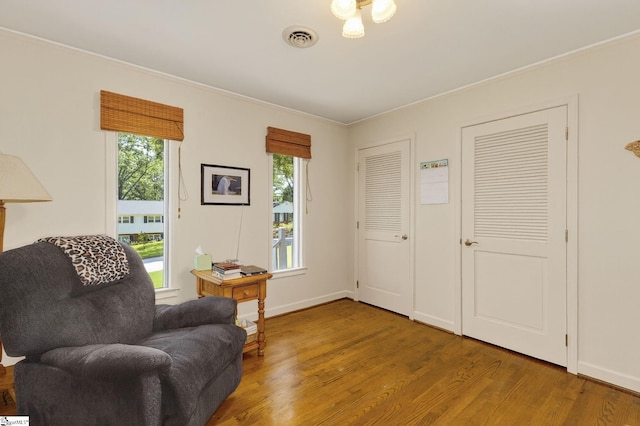 306 Verner Dr, Greenville, SC 29617 - living area featuring wood finished floors and crown molding