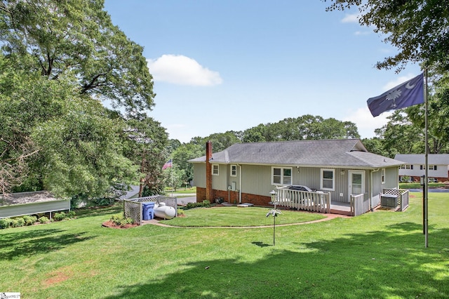 306 Verner Dr, Greenville, SC 29617 - rear view of house featuring a chimney, a yard, a deck, and roof with shingles