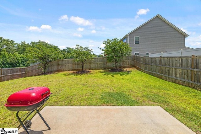 202 Huron Way, Greenville, SC 29607 - fenced backyard featuring a patio area