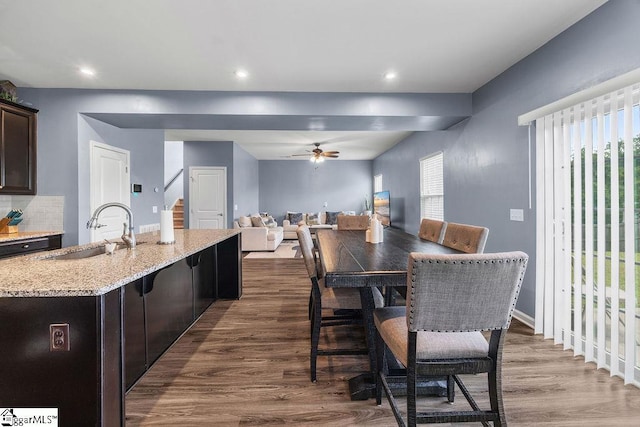 202 Huron Way, Greenville, SC 29607 - dining room featuring dark wood-type flooring, a ceiling fan, recessed lighting, and stairway