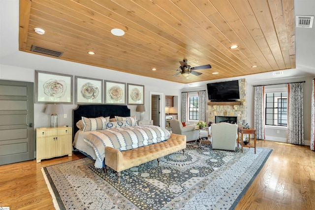 155 Village Point Dr, Sunset, SC 29685 - bedroom featuring wooden ceiling, recessed lighting, a stone fireplace, and light wood-style flooring