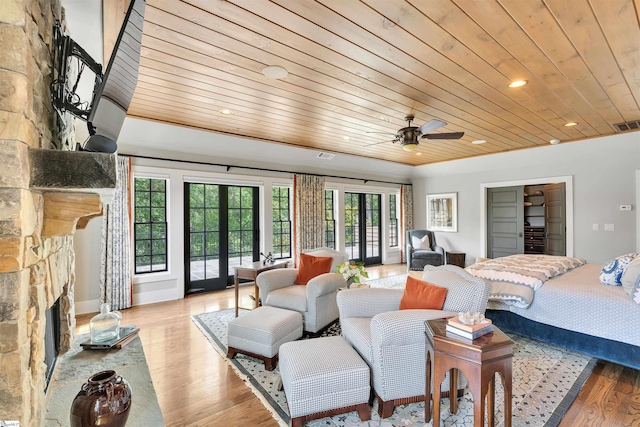 155 Village Point Dr, Sunset, SC 29685 - bedroom with wood ceiling, access to exterior, a fireplace, light wood-style flooring, and recessed lighting