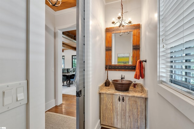 155 Village Point Dr, Sunset, SC 29685 - bathroom featuring a chandelier, vanity, and wood finished floors