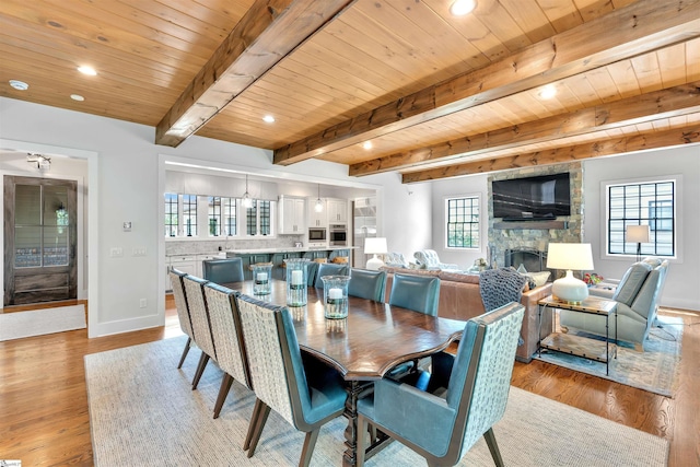 155 Village Point Dr, Sunset, SC 29685 - dining room with a wooden ceiling with exposed beams, light wood-style floors, a fireplace, and recessed lighting