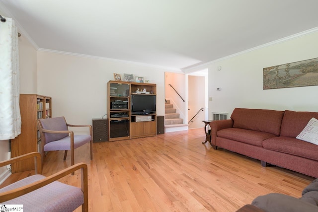 14 Rollingreen Rd, Greer, SC 29651 - living area featuring crown molding, light wood-style floors, and stairway