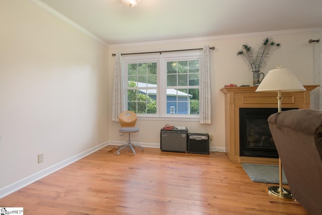 14 Rollingreen Rd, Greer, SC 29651 - sitting room featuring light wood finished floors, ornamental molding, and a fireplace