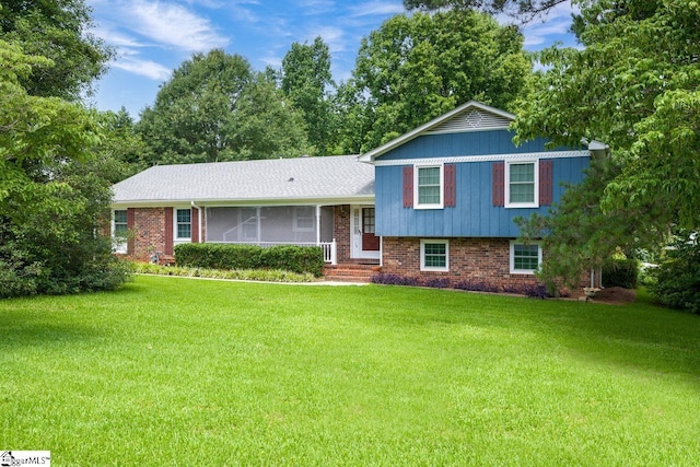 14 Rollingreen Rd, Greer, SC 29651 - split level home with a front lawn and brick siding