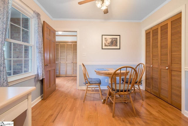 14 Rollingreen Rd, Greer, SC 29651 - dining space with crown molding, healthy amount of natural light, a ceiling fan, and light wood-type flooring