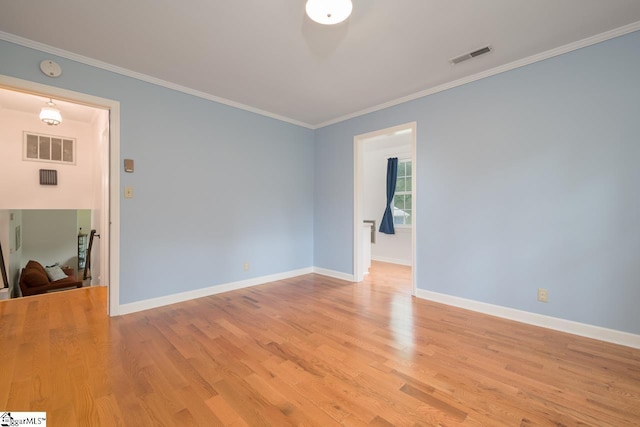 14 Rollingreen Rd, Greer, SC 29651 - spare room with light wood finished floors and crown molding
