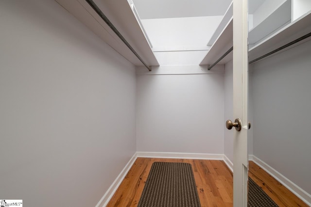 14 Rollingreen Rd, Greer, SC 29651 - spacious closet with light wood-style flooring