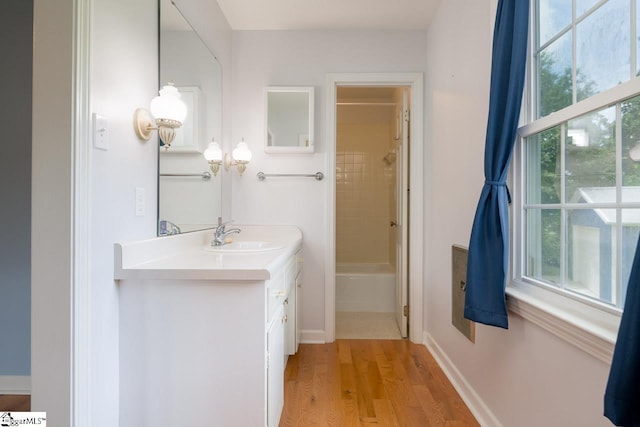 14 Rollingreen Rd, Greer, SC 29651 - bathroom featuring vanity, wood finished floors, and  shower combination