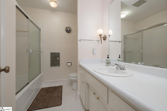 14 Rollingreen Rd, Greer, SC 29651 - full bath with tile patterned floors, vanity, and bath / shower combo with glass door