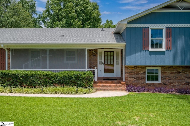 14 Rollingreen Rd, Greer, SC 29651 - split level home featuring brick siding, a front lawn, roof with shingles, and board and batten siding