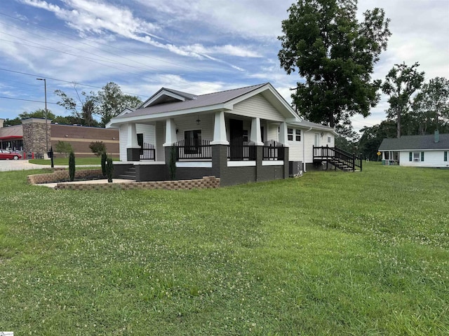 23 N Greenwood Avenue Extension, Ware Shoals, SC 29692 - view of front facade with covered porch and a front yard