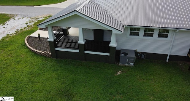 23 N Greenwood Avenue Extension, Ware Shoals, SC 29692 - back of property featuring a lawn and a metal roof