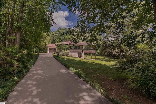 421 E Westbrooks Rd, Seneca, SC 29678 - view of front of home with a front lawn, driveway, a garage, and a wooden deck