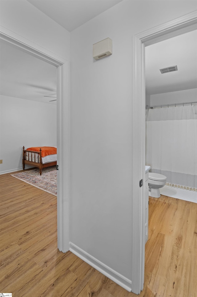 421 E Westbrooks Rd, Seneca, SC 29678 - hallway featuring wood finished floors and baseboards