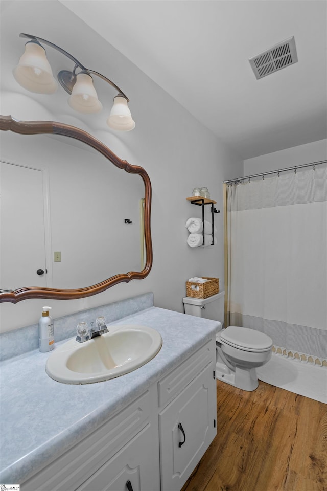 421 E Westbrooks Rd, Seneca, SC 29678 - bathroom featuring vanity, wood finished floors, and curtained shower
