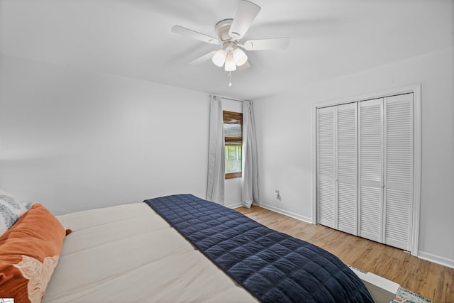 421 E Westbrooks Rd, Seneca, SC 29678 - bedroom featuring wood finished floors, a ceiling fan, and a closet