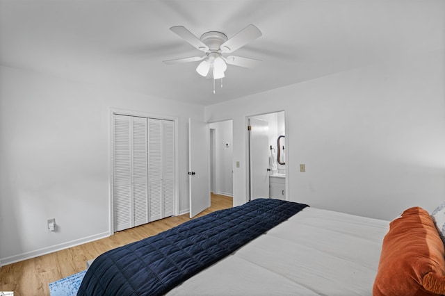 421 E Westbrooks Rd, Seneca, SC 29678 - bedroom featuring wood finished floors, a closet, ensuite bath, and a ceiling fan