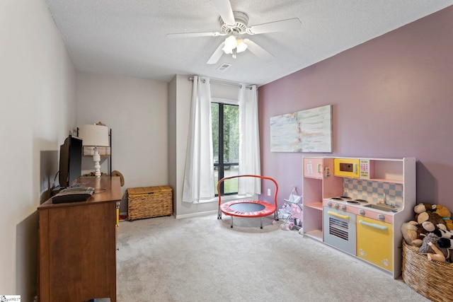 522 Reid School Rd, Taylors, SC 29687 - rec room with carpet, a ceiling fan, and a textured ceiling