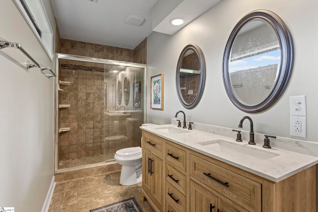 522 Reid School Rd, Taylors, SC 29687 - bathroom with double vanity, a shower stall, and recessed lighting