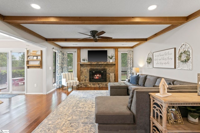522 Reid School Rd, Taylors, SC 29687 - living area featuring wood finished floors, beamed ceiling, ceiling fan, a fireplace, and recessed lighting