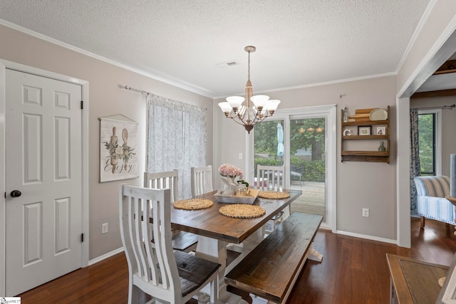 522 Reid School Rd, Taylors, SC 29687 - dining space featuring a chandelier, a textured ceiling, hardwood / wood-style floors, and crown molding