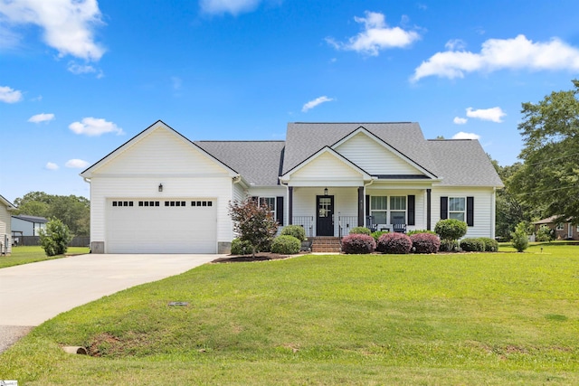 417 Addison Cir, Pelzer, SC 29669 - view of front of home with a porch, an attached garage, driveway, and a front yard