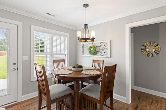 417 Addison Cir, Pelzer, SC 29669 - dining space with a chandelier, healthy amount of natural light, crown molding, and wood finished floors