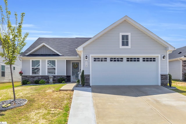 118 Sylvester St, Fountain Inn, SC 29644 - view of front of property with stone siding, a front lawn, concrete driveway, an attached garage, and board and batten siding