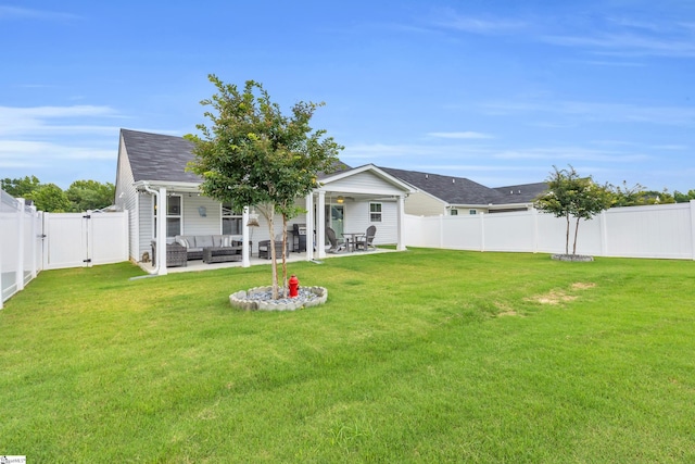 118 Sylvester St, Fountain Inn, SC 29644 - back of house with an outdoor living space, a fenced backyard, a gate, a patio area, and roof with shingles