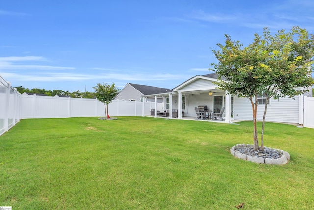118 Sylvester St, Fountain Inn, SC 29644 - fenced backyard with a patio area