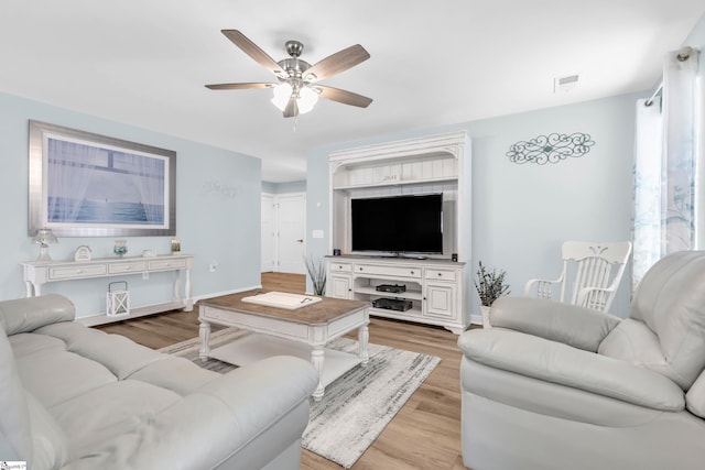 118 Sylvester St, Fountain Inn, SC 29644 - living area with ceiling fan and light wood-style floors