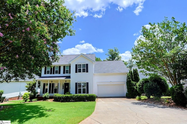 11 Hickory Hollow Ct, Greenville, SC 29607 - view of front facade featuring driveway, an attached garage, a front lawn, a porch, and roof with shingles
