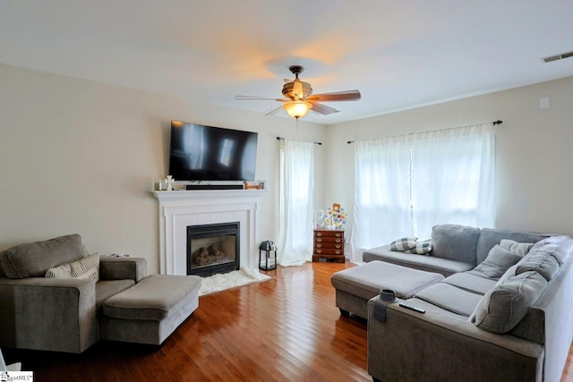 11 Hickory Hollow Ct, Greenville, SC 29607 - living area with a fireplace, ceiling fan, and dark wood-type flooring