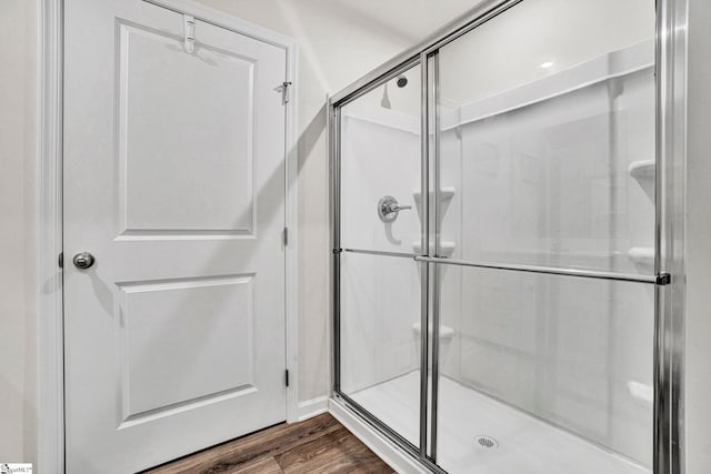 124 Highland Station Dr, Clinton, SC 29325 - full bathroom with a shower stall and wood finished floors