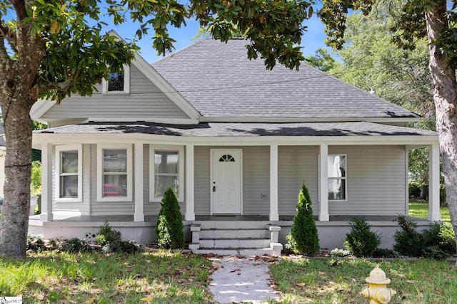 904 W Hampton St, Laurens, SC 29360 - view of front of home featuring a shingled roof and covered porch