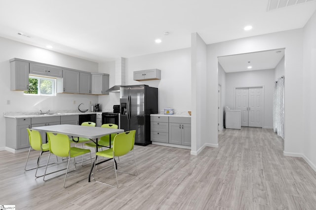 904 W Hampton St, Laurens, SC 29360 - kitchen featuring gray cabinetry, black appliances, light countertops, and recessed lighting