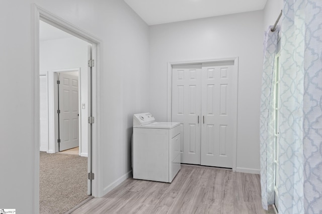 904 W Hampton St, Laurens, SC 29360 - laundry area with washer / dryer and light wood finished floors