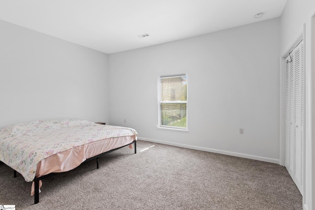 904 W Hampton St, Laurens, SC 29360 - bedroom with carpet flooring
