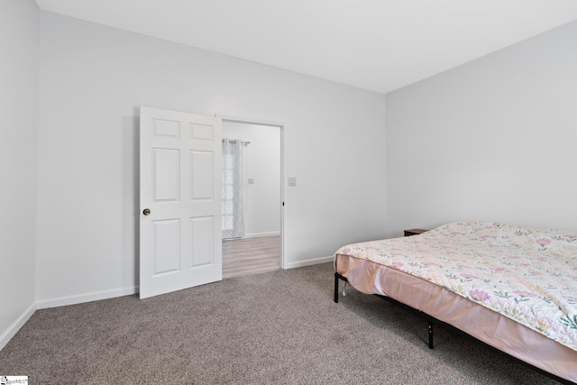 904 W Hampton St, Laurens, SC 29360 - carpeted bedroom with baseboards