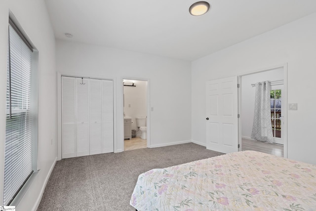 904 W Hampton St, Laurens, SC 29360 - carpeted bedroom featuring ensuite bath and a closet