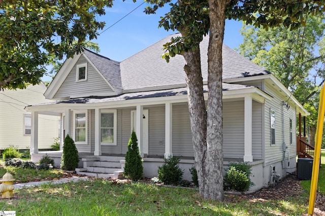 904 W Hampton St, Laurens, SC 29360 - view of front of property featuring a shingled roof and covered porch