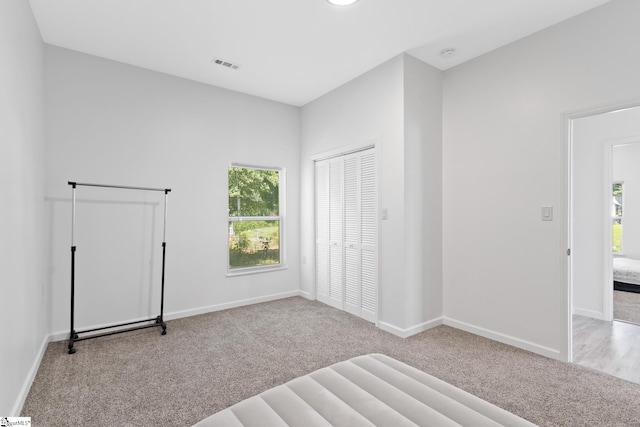 904 W Hampton St, Laurens, SC 29360 - unfurnished bedroom with carpet flooring and a closet