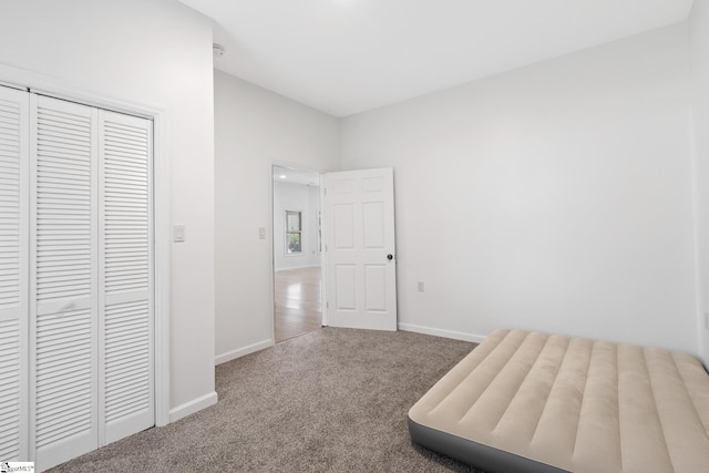 904 W Hampton St, Laurens, SC 29360 - unfurnished bedroom featuring carpet floors and a closet