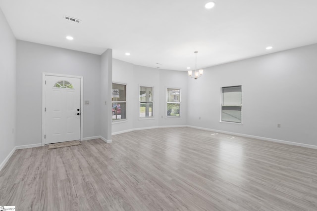904 W Hampton St, Laurens, SC 29360 - foyer featuring healthy amount of natural light, recessed lighting, a chandelier, and light wood-style flooring