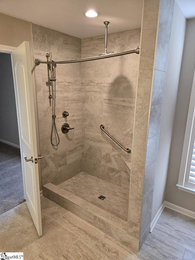 303 Plantation Pt, Anderson, SC 29625 - full bathroom featuring a tile shower and baseboards