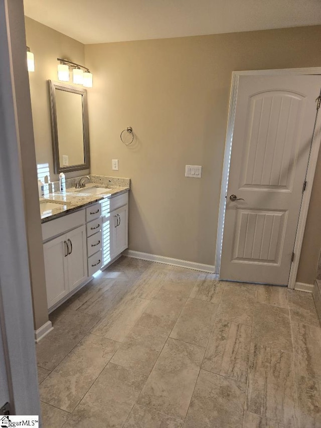 303 Plantation Pt, Anderson, SC 29625 - full bathroom featuring double vanity and baseboards